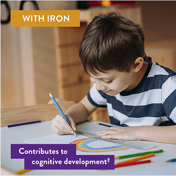 A child carefully focussed at a desk colouring in a rainbow, with wording to support that the product has iron for cognitive development