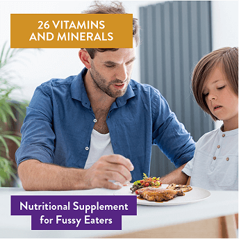 A man and child at a table with an uneaten plate in front of the child, supported with text highlighting multivitamins for filling nutritional gaps of fussy eaters