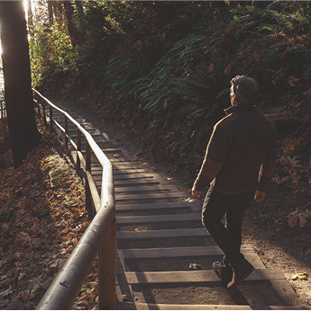 Man taking the first steps on a scenic hike