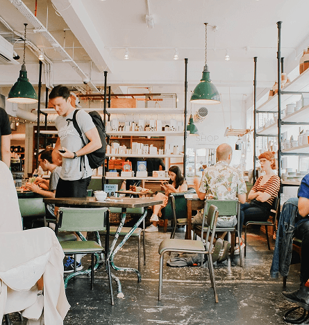 Busy Cafe scene with green colour scheme