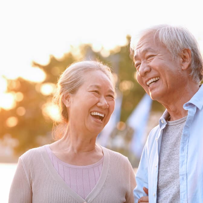 Elderly couple smiling together